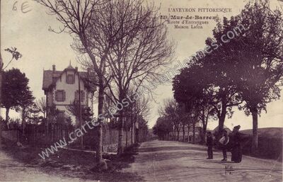 Carte postale ancienne Route d'Entraygues Maison Lafon — Mur-de-Barrez (Aveyron)