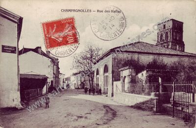 Carte postale ancienne Rue des Halles — Champagnolles (Charente-Maritime)