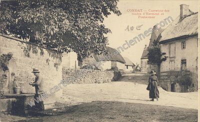 Carte postale ancienne Carrefour des routes d'Herment et Pontaumur — Condat (Cantal)