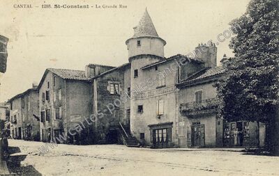 Carte postale ancienne La Grande Rue — Saint-Constant (Cantal)