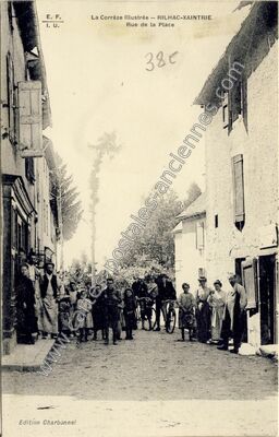 Carte postale ancienne Rue de la Place — Rilhac-Xaintrie (Corrèze)