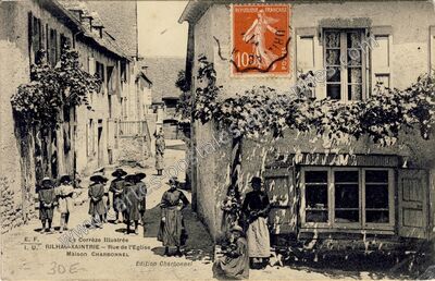 Carte postale ancienne Rue de l'Eglise, Maison Charbonnel — Rilhac-Xaintrie (Corrèze)