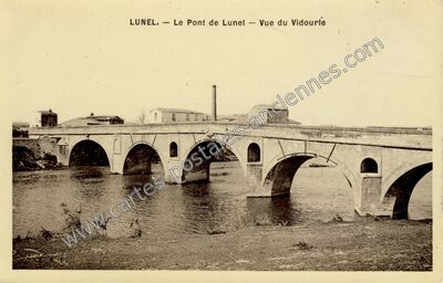 Carte postale ancienne Le Pont de Lunel — Vue du Vidourle — Lunel (Hérault)