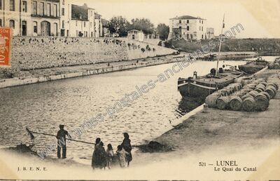 Carte postale ancienne Le Quai du Canal — Lunel (Hérault)