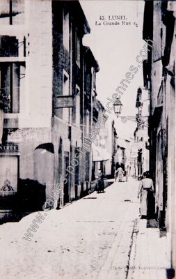 Carte postale ancienne La Grande Rue — Lunel (Hérault)