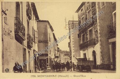 Carte postale ancienne Grand'Rue — Montagnac (Hérault)