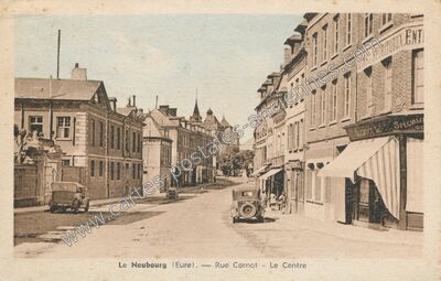 Carte postale ancienne Rue Carnot - Le Centre — Le Neubourg (Eure)