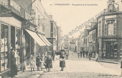 Carte postale ancienne Perspective de la Grande-Rue — Nonancourt (Eure)