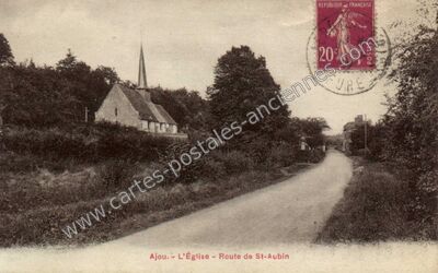 Carte postale ancienne L'Église - Route de St-Aubin — Ajou (Eure)