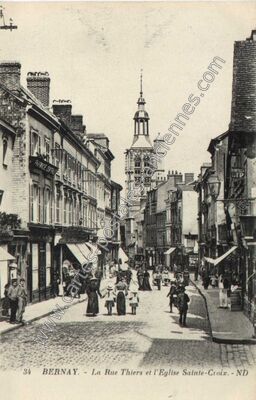 Carte postale ancienne La Rue Thiers et l'Eglise Sainte-Croix — Bernay (Eure)