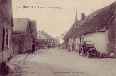 Carte postale ancienne Rue principale — Mignières (Eure-et-Loir)
