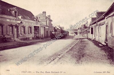 Carte postale ancienne Une Rue, Route Nationale N° 10 — Thivars (Eure-et-Loir)