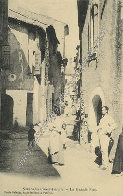 Carte postale ancienne La Grande Rue — Saint-Quentin-la-Poterie (Gard)