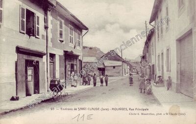 Carte postale ancienne Rue Principale — Molinges (Jura)