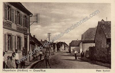 Carte postale ancienne Grand'Rue — Meyenheim (Haut-Rhin)