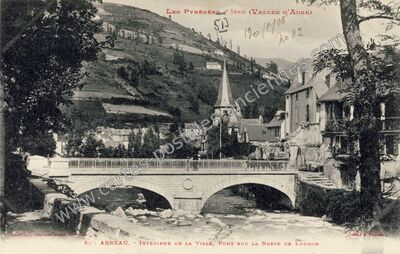 Carte postale ancienne Intérieur de la ville, pont sur la Neste de Louron — Arreau (Hautes-Pyrénées)