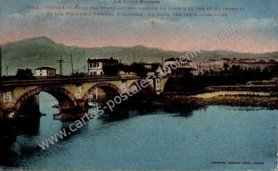 Carte postale ancienne Vue des ponts internationaux du chemin de fer et du tramway et les premières maisons… — Hendaye (Pyrénées-Atlantiques)