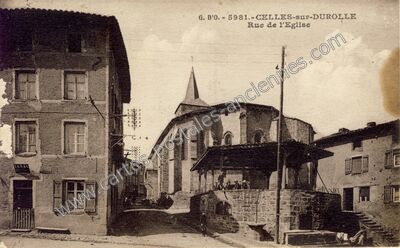 Carte postale ancienne Rue de l'Eglise — Celles-sur-Durolle (Puy-de-Dôme)