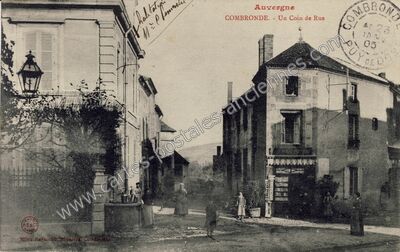 Carte postale ancienne Un Coin de Rue — Combronde (Puy-de-Dôme)