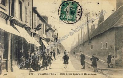 Carte postale ancienne Rue Jean-Jacques-Rousseau — Commentry (Allier)