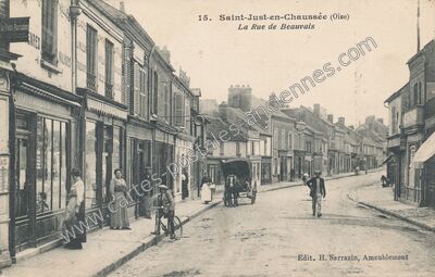 Carte postale ancienne La Rue de Beauvais — Saint-Just-en-Chaussée (Oise)
