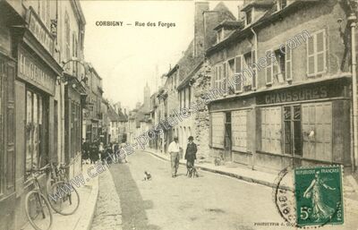 Carte postale ancienne Rue des Forges — Corbigny (Nièvre)