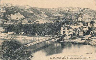 Carte postale ancienne Cajarc et le Pont suspendu sur le Lot — Cajarc (Lot)