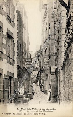 Carte postale ancienne La Rue et les Marchands — Le Mont-Saint-Michel (Manche)