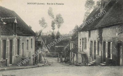 Carte postale ancienne Rue de la Fontaine — Douchy (Loiret)