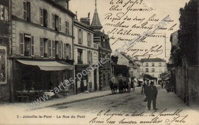 Carte postale ancienne La Rue du Pont — Joinville-le-Pont (Val-de-Marne)