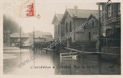 Carte postale ancienne L'inondation, Rue de Seine — Colombes (Hauts-de-Seine)