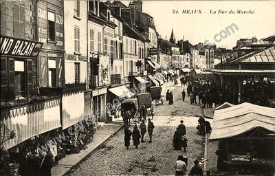 Carte postale ancienne La Rue du Marché — Meaux (Seine-et-Marne)