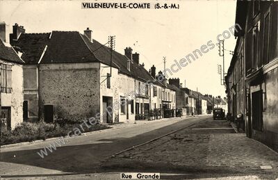 Carte postale ancienne Rue Grande — Villeneuve-le-Comte (Seine-et-Marne)