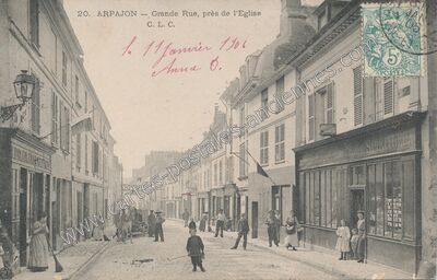 Carte postale ancienne Grande Rue, près de l'Eglise — Arpajon (Essonne)