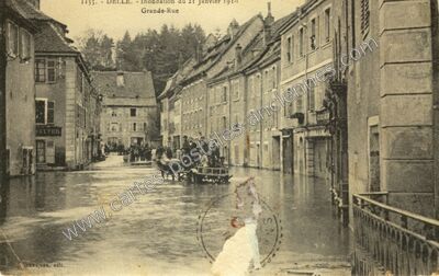 Carte postale ancienne Inondation du 27 Janvier 1910 Grande-Rue — Delle (Territoire de Belfort)