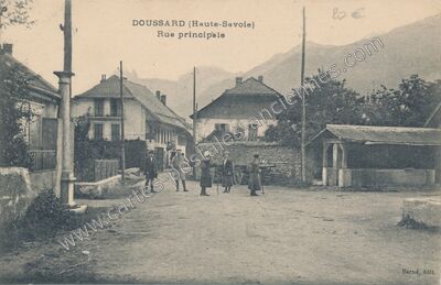 Carte postale ancienne Rue principale — Doussard (Haute-Savoie)