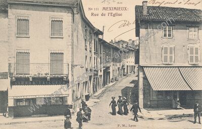 Carte postale ancienne Rue de l'Eglise — Meximieux (Ain)