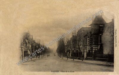 Carte postale ancienne Rue de la Gare — Nangis (Seine-et-Marne)